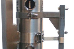 Self-cleaning filter for sanitary applications